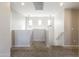 Spacious loft with carpeting and dual pendant lights, perfect for flexible living at 1349 E Dunbar Dr, Phoenix, AZ 85042