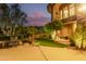 Spacious backyard featuring mature trees, lawn area, and a cozy spot for relaxation with views at 15827 E Firerock County Club Dr, Fountain Hills, AZ 85268