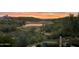 Scenic landscape view with rolling hills, lake, and golf course creates a serene outdoor setting at 15827 E Firerock County Club Dr, Fountain Hills, AZ 85268