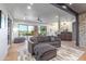 Open concept living room with comfortable furniture, and direct access to outdoor patio at 15827 E Firerock County Club Dr, Fountain Hills, AZ 85268