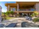 Back patio featuring a lounge area, dining set, and a spa for outdoor relaxation and entertainment at 15827 E Firerock County Club Dr, Fountain Hills, AZ 85268