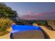 Inviting infinity pool features captivating landscape views providing the perfect place to unwind at 15827 E Firerock County Club Dr, Fountain Hills, AZ 85268