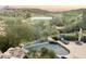 Inviting pool with stunning view creates the perfect backyard oasis for relaxation and leisure at 15827 E Firerock County Club Dr, Fountain Hills, AZ 85268