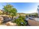 Beautiful pool area with a waterfall feature and scenic views of the surrounding landscape at 15827 E Firerock County Club Dr, Fountain Hills, AZ 85268
