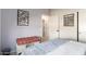 Cozy bedroom with modern décor, comfortable bed, and ample natural light at 15876 W Alpine Ridge Dr, Surprise, AZ 85374