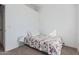 A well-lit bedroom with a single bed, lamp, and neutral carpet at 1601 N Saba St # 264, Chandler, AZ 85225