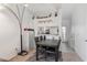 Comfortable dining area with modern lighting fixtures and ample seating for everyday living at 1601 N Saba St # 264, Chandler, AZ 85225