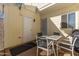 Private patio offers outdoor dining with seating for four, showcasing the cozy exterior at 1601 N Saba St # 264, Chandler, AZ 85225