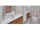 Bathroom featuring a double vanity and tiled floor at 16247 W Desert Mirage Dr, Surprise, AZ 85379
