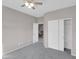 Bedroom with neutral carpet and light colored walls at 16247 W Desert Mirage Dr, Surprise, AZ 85379