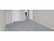 Bedroom with neutral carpet and light colored walls at 16247 W Desert Mirage Dr, Surprise, AZ 85379