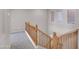 Stairway features a wooden banister and light gray walls at 16247 W Desert Mirage Dr, Surprise, AZ 85379