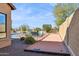 Relaxing backyard featuring a pool, bocce ball court, lounge seating, and desert landscaping at 1646 N Channing --, Mesa, AZ 85207