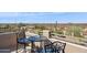 Balcony with a table and seating with desert views at 1646 N Channing --, Mesa, AZ 85207