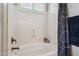 Bright bathroom features a white soaking tub with bronze fixtures and a window for natural light at 1646 N Channing --, Mesa, AZ 85207