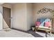 Inviting entryway with a decorative bench and an interesting wall decoration at 1646 N Channing --, Mesa, AZ 85207