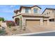 Charming two-story home with a three-car garage and attractive desert landscaping at 1646 N Channing --, Mesa, AZ 85207