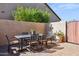 Outdoor dining space on a brick patio, perfect for entertaining and relaxation at 1646 N Channing --, Mesa, AZ 85207