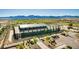 Exterior of the building with golf carts parked outside and scenic mountain views at 17336 W Crawfordsville Dr, Surprise, AZ 85388