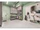 This garage has an epoxy floor and organized storage at 17336 W Crawfordsville Dr, Surprise, AZ 85388