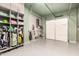 This garage has an epoxy floor and organized storage at 17336 W Crawfordsville Dr, Surprise, AZ 85388