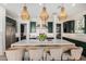 Beautiful kitchen featuring a large island with bar seating, modern appliances, and lots of storage space at 17336 W Crawfordsville Dr, Surprise, AZ 85388