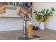 Outdoor bar with custom tap offers a refreshing drink with a view of pool and deck at 17336 W Crawfordsville Dr, Surprise, AZ 85388