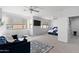 Spacious bedroom with a sitting area and bright windows, creating a comfortable and open living space at 1835 E Bartlett Pl, Chandler, AZ 85249