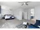 Main bedroom featuring carpeted floors, bright windows and stylish furnishings at 1835 E Bartlett Pl, Chandler, AZ 85249