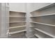 Pantry with white shelves at 1835 E Bartlett Pl, Chandler, AZ 85249