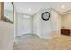 Inviting entryway with decorative mirror, tiled floors, and easy access to other rooms at 20049 N Siesta Rock Dr, Surprise, AZ 85374