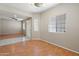 Open dining room with vinyl flooring, ample lighting and seamless transition to the living spaces at 2051 W Ronald Rd, Phoenix, AZ 85029