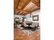Dining room featuring a wood beam ceiling, tiled floors, and a stylish chandelier at 2548 E Vermont Ave, Phoenix, AZ 85016