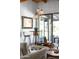 Intriguing living room with hardwood floors, modern lighting, and seamless transition to the outdoor patio at 2548 E Vermont Ave, Phoenix, AZ 85016