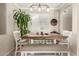 Cozy dining area featuring a table with bench seating and modern pendant lighting at 2992 N Miller Rd # 219B, Scottsdale, AZ 85251