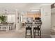 Open-concept kitchen offering bar seating and seamless flow to dining area at 2992 N Miller Rd # 219B, Scottsdale, AZ 85251