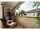 Cozy outdoor patio featuring comfortable wicker furniture and desert landscaping at 2992 N Miller Rd # 219B, Scottsdale, AZ 85251