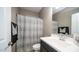 Bathroom featuring a modern vanity and a patterned shower curtain at 30324 W Crittenden Ln, Buckeye, AZ 85396