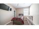 Bedroom with comfortable bed and a TV on the wall, creating a cozy space at 30324 W Crittenden Ln, Buckeye, AZ 85396