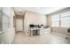 A bright home office with tile flooring, natural light, desk, and storage solutions at 30324 W Crittenden Ln, Buckeye, AZ 85396