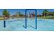 Community splash pad offers water features, play equipment, and picnic tables at 30324 W Crittenden Ln, Buckeye, AZ 85396