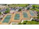 Aerial view of community tennis courts with new surfaces and updated amenities at 30324 W Crittenden Ln, Buckeye, AZ 85396