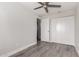 Cozy bedroom offers new gray floors and large closets, perfect for storage at 3120 N 67Th Ln # 96, Phoenix, AZ 85033