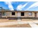 Exterior shot of a single-story home featuring a walkway leading to the front door at 3120 N 67Th Ln # 96, Phoenix, AZ 85033