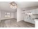 Open-concept floor plan with updated lighting and new floors, great for entertaining at 3120 N 67Th Ln # 96, Phoenix, AZ 85033