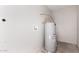 Utility room with gray water heater and access for laundry hookups at 3120 N 67Th Ln # 96, Phoenix, AZ 85033