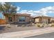 Charming home featuring desert landscaping, stone accents, and a two-car garage at 31626 N 129Th Dr, Peoria, AZ 85383