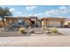 Beautiful home with desert landscaping, brick walkway, and a two-car garage at 31626 N 129Th Dr, Peoria, AZ 85383