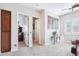 A carpeted hallway leads from the office to the other parts of the home at 31626 N 129Th Dr, Peoria, AZ 85383