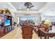 Bright living room with leather furniture, recessed lighting, and a view to the backyard at 31626 N 129Th Dr, Peoria, AZ 85383